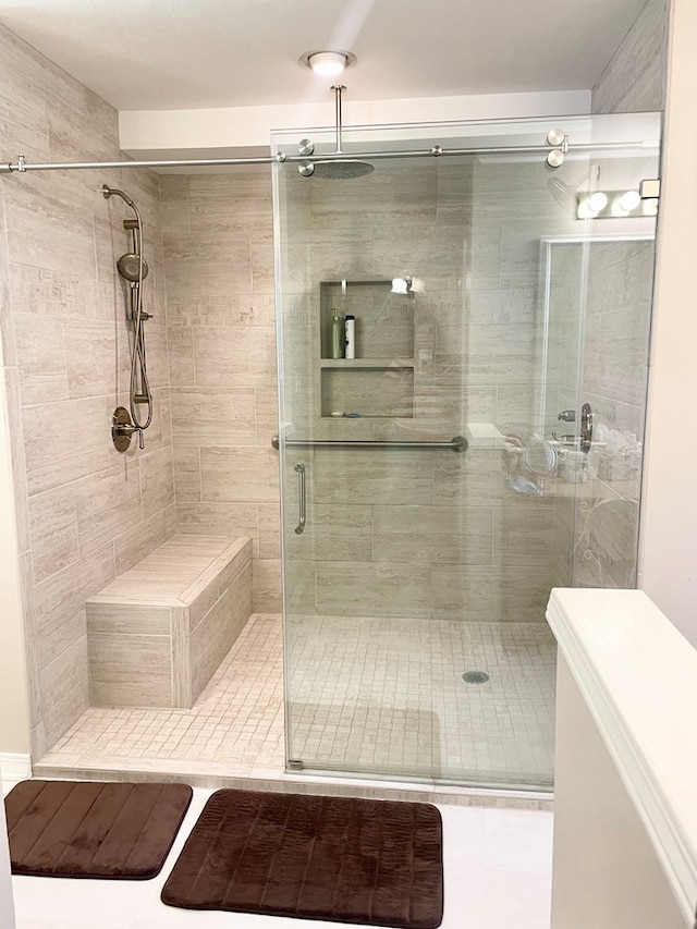 bathroom featuring an enclosed shower