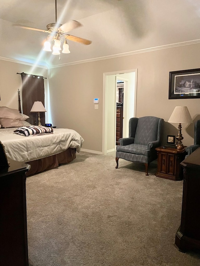 bedroom with carpet flooring, ceiling fan, and crown molding