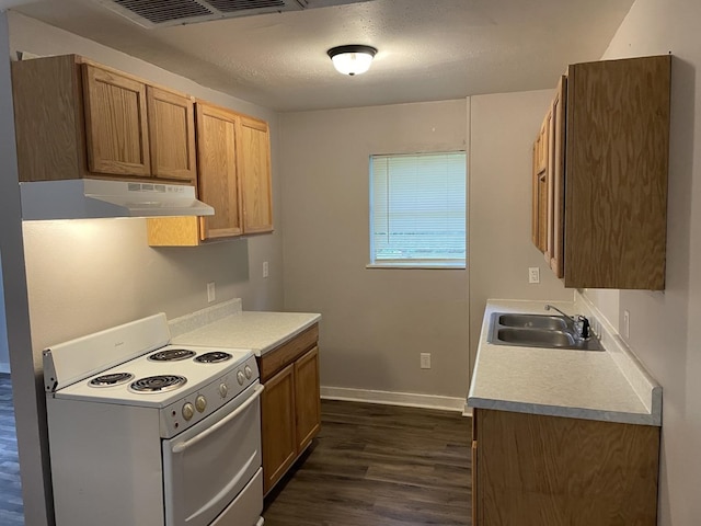 kitchen featuring sink, dark wood-type flooring, a textured ceiling, and electric stove