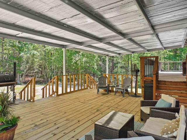 deck with an outdoor hangout area