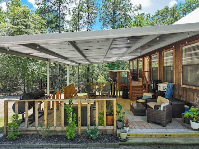 deck with an outdoor hangout area