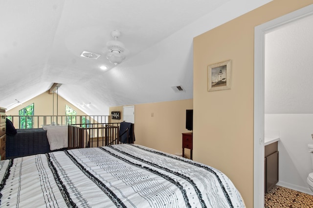 bedroom with vaulted ceiling