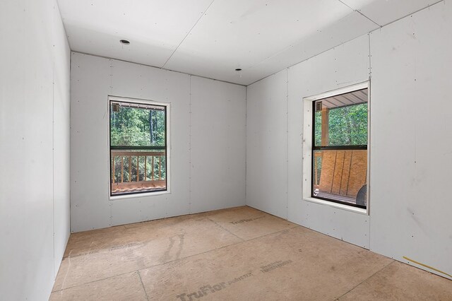 415 Sloe Ln, Brookeland, TX 75931 - empty room featuring plenty of natural light