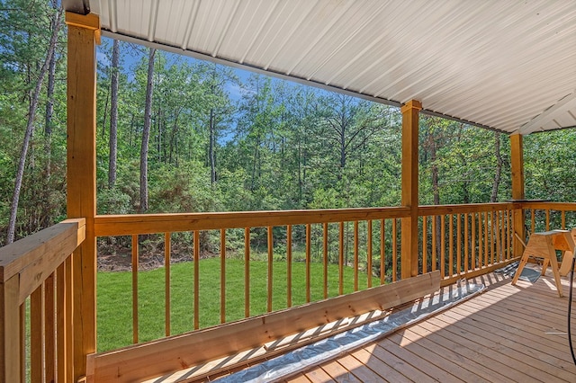 415 Sloe Ln, Brookeland, TX 75931 - deck featuring a lawn and a view of trees