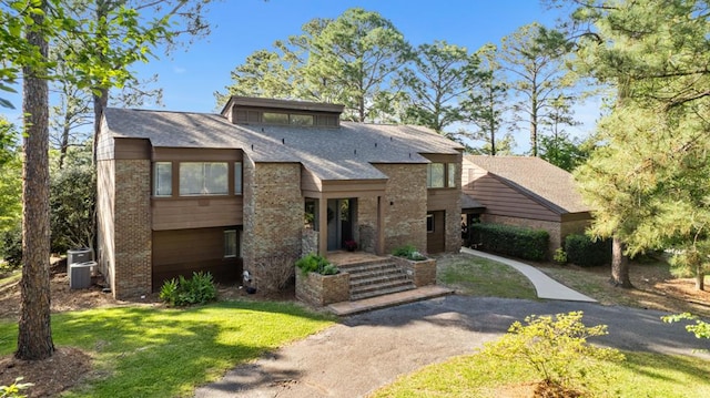 view of front of property with central AC unit