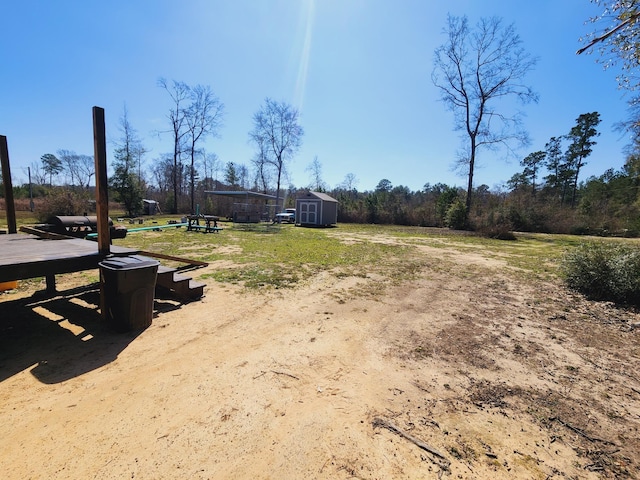 view of yard with a storage shed