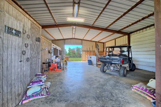 garage with wood walls