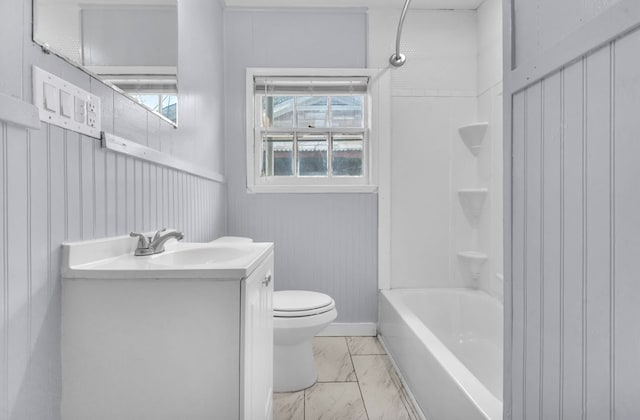 210 Forest Park Blvd, Lufkin, TX 75904 - bathroom featuring marble look tiles, vanity, and shower / bath combination