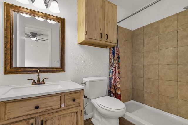 bathroom featuring ceiling fan, vanity, toilet, and a shower with shower curtain