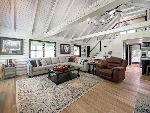 living room featuring wood ceiling, ceiling fan, hardwood / wood-style flooring, high vaulted ceiling, and beamed ceiling