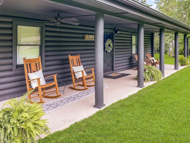 view of patio featuring ceiling fan and a porch