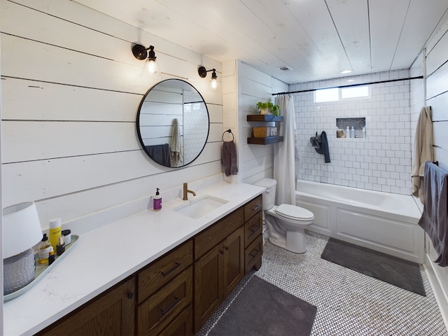 full bathroom with vanity, tile patterned floors, shower / bath combination with curtain, wooden walls, and toilet