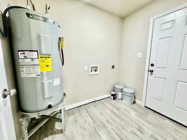 utility room featuring electric water heater