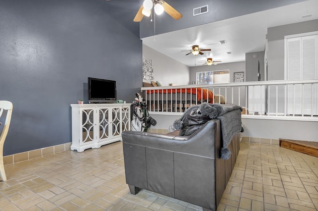 living room featuring ceiling fan