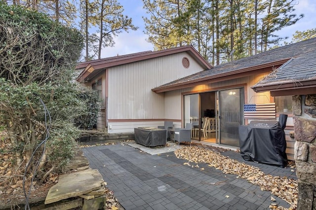 rear view of property with a patio area