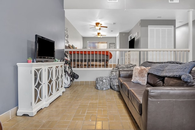 living room with ceiling fan