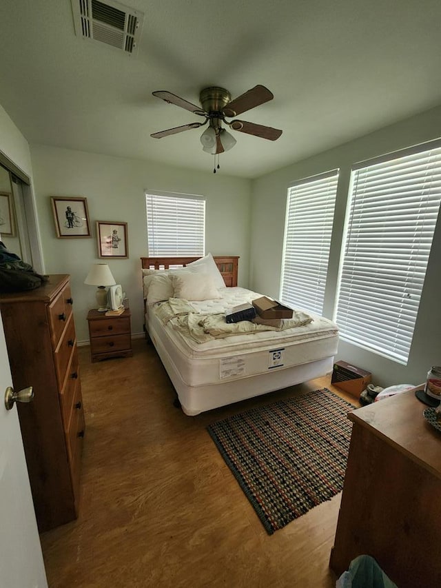 4710 County Road 082, Jasper, TX 75951 - bedroom featuring a ceiling fan and wood finished floors
