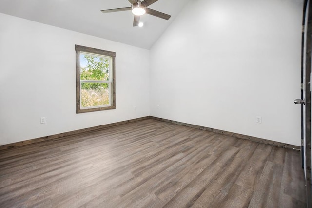 spare room featuring a ceiling fan, wood finished floors, and high vaulted ceiling