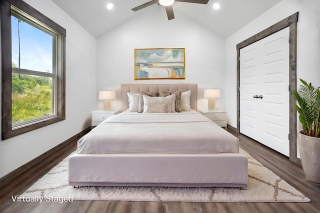 bedroom with lofted ceiling, wood finished floors, baseboards, recessed lighting, and a ceiling fan