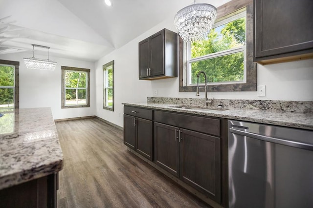 kitchen with dishwasher, a sink, a chandelier, lofted ceiling, and healthy amount of natural light