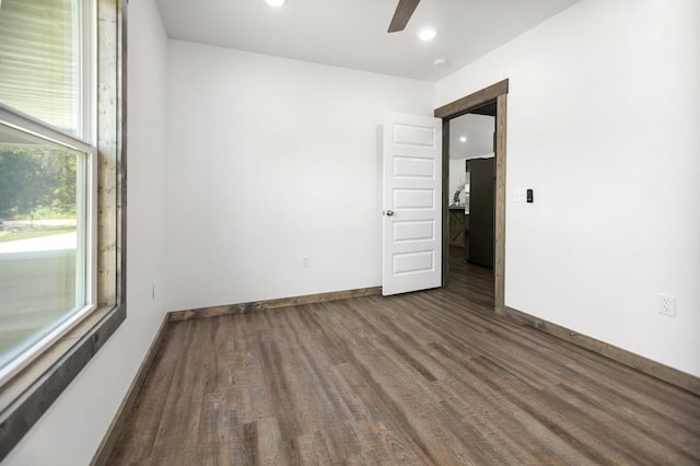 unfurnished room featuring a ceiling fan, wood finished floors, baseboards, and recessed lighting