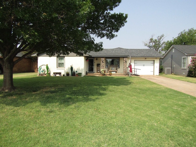 ranch-style home with a front yard, a garage, and cooling unit