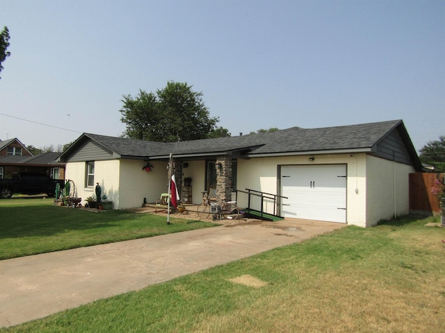 single story home featuring a front lawn and a garage