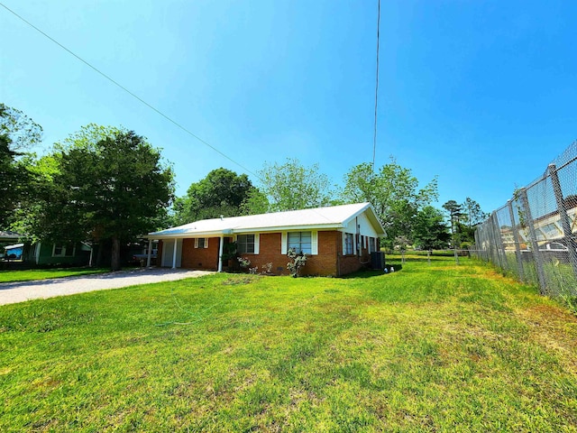 1100 Worth St, Hemphill, TX 75948 - ranch-style home with gravel driveway and brick siding