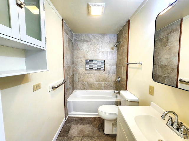 full bathroom with vanity, toilet, and tiled shower / bath