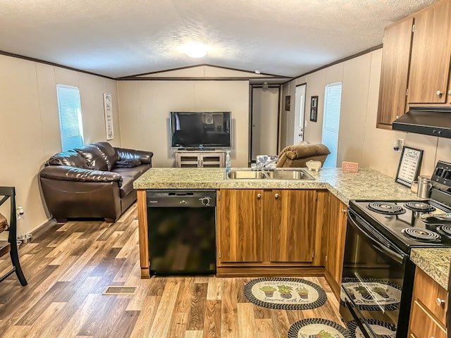 kitchen with extractor fan, sink, black appliances, light hardwood / wood-style floors, and lofted ceiling