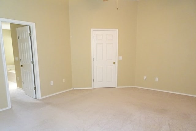 4805 Champions Dr, Lufkin, TX 75901 - carpeted spare room with baseboards and a ceiling fan