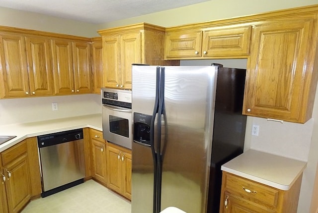 kitchen with appliances with stainless steel finishes