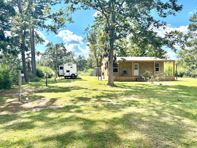 view of yard with a porch
