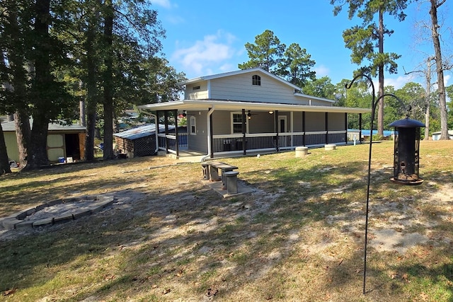 view of front of house with ceiling fan and covered porch