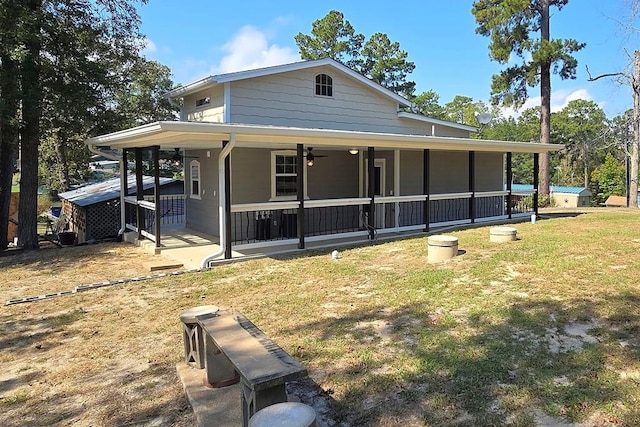 view of front of property with a front yard and a porch