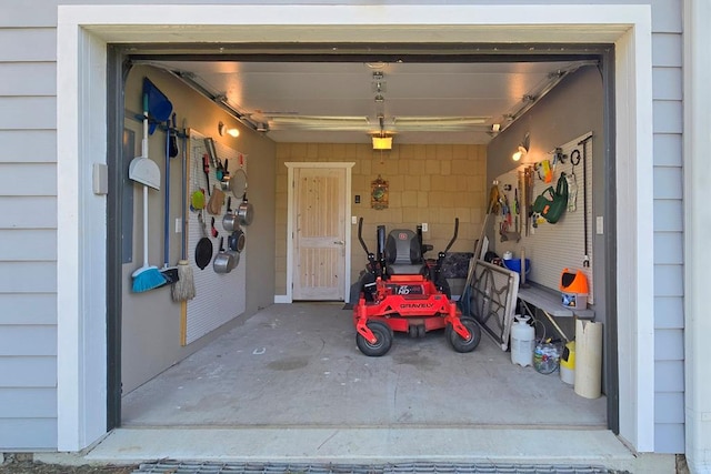 garage featuring a garage door opener