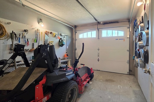 garage featuring a workshop area