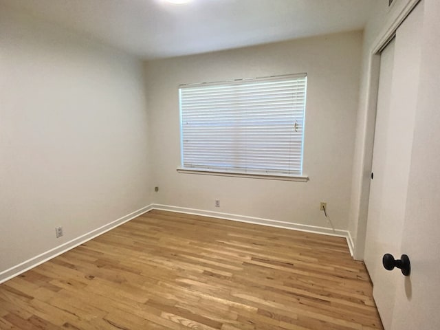 interior space featuring a closet and light hardwood / wood-style flooring