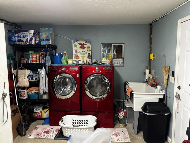 washroom featuring separate washer and dryer and sink