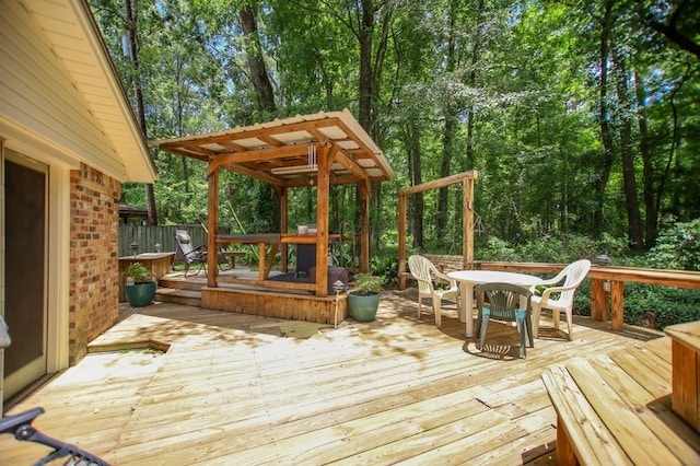 309 Echo Ln, Lufkin, TX 75904 - wooden deck featuring outdoor dining area