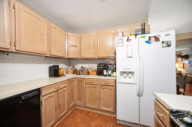 309 Echo Ln, Lufkin, TX 75904 - kitchen with white refrigerator with ice dispenser, dishwasher, light countertops, decorative backsplash, and light brown cabinetry