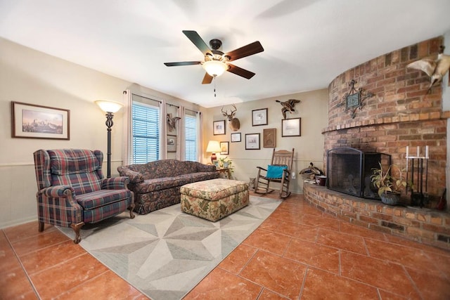309 Echo Ln, Lufkin, TX 75904 - tiled living area with ceiling fan and a brick fireplace