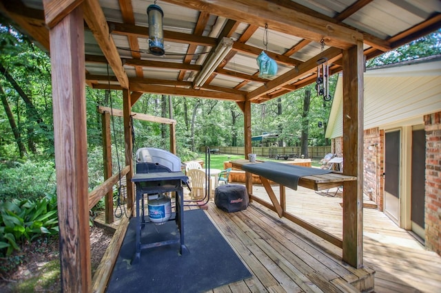 309 Echo Ln, Lufkin, TX 75904 - wooden terrace with grilling area and view of scattered trees