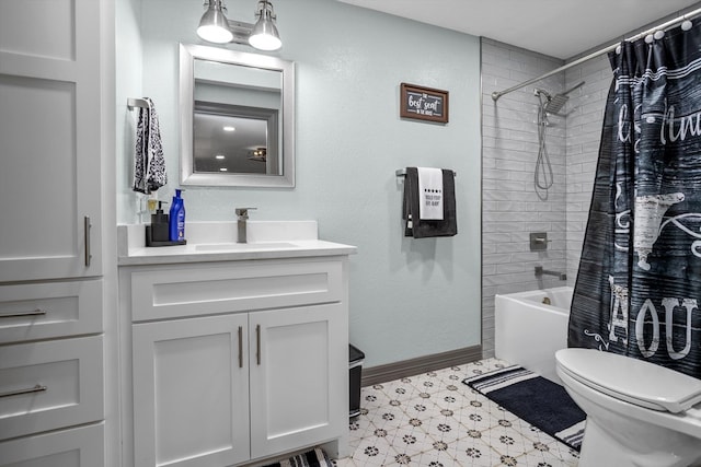 full bathroom featuring shower / bath combo with shower curtain, vanity, and toilet