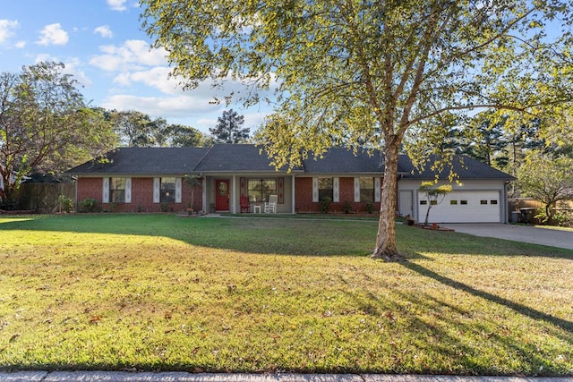 single story home featuring a garage and a front lawn