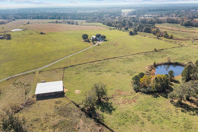 aerial view with a rural view and a water view