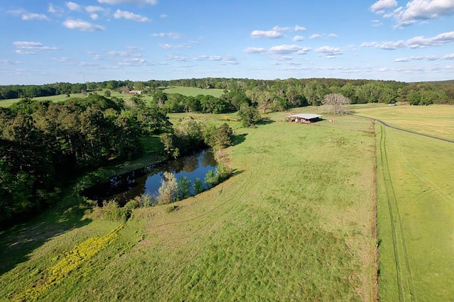aerial view with a rural view and a water view