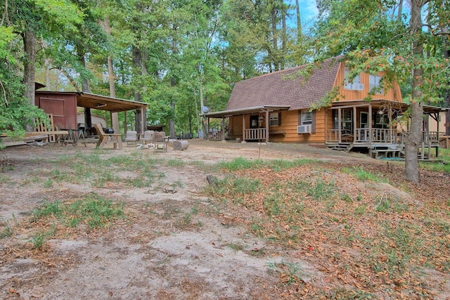 view of yard with an outbuilding and cooling unit