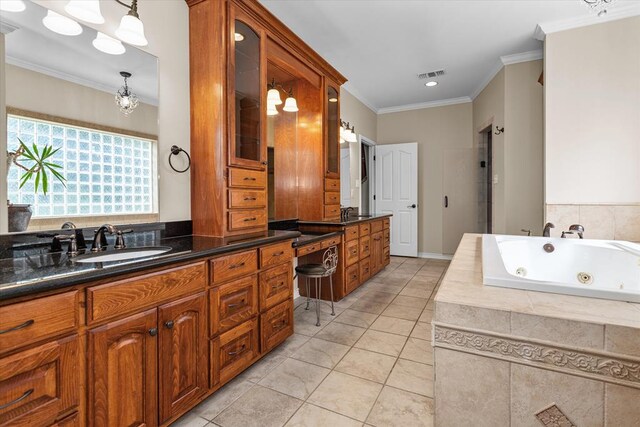 bathroom with tile patterned floors, a relaxing tiled tub, crown molding, and vanity