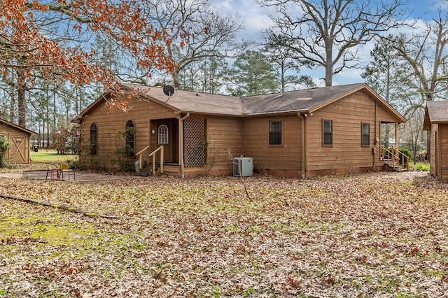 229 Thornton Rd, Huntington, TX 75949 - back of house featuring entry steps and central air condition unit